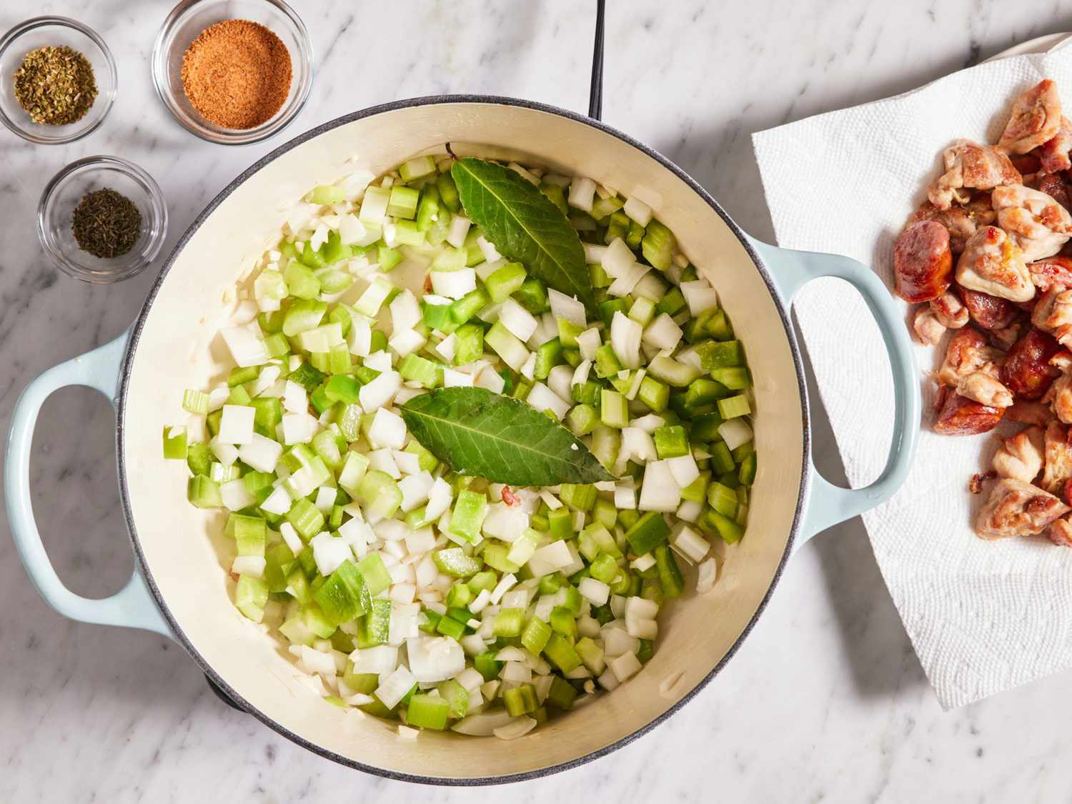 The Holy Trinity & More: Exploring Jambalaya's Core Ingredients & Origins